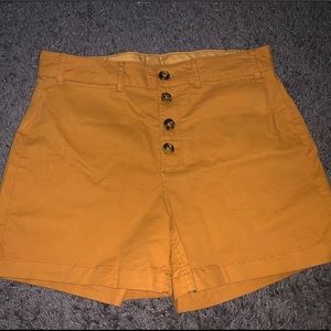 Size 10 mustard yellow stretchy shorts